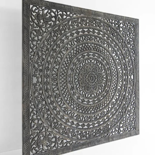 Profile view of dark wooden California king headboard showing depth and intricate layers of carved mandala design